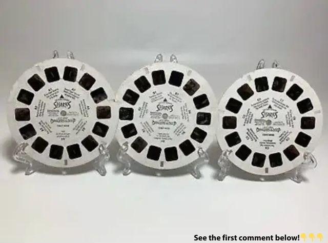 A set of classic vintage view master reels, once a popular way to view 3D images from various scenes or movies